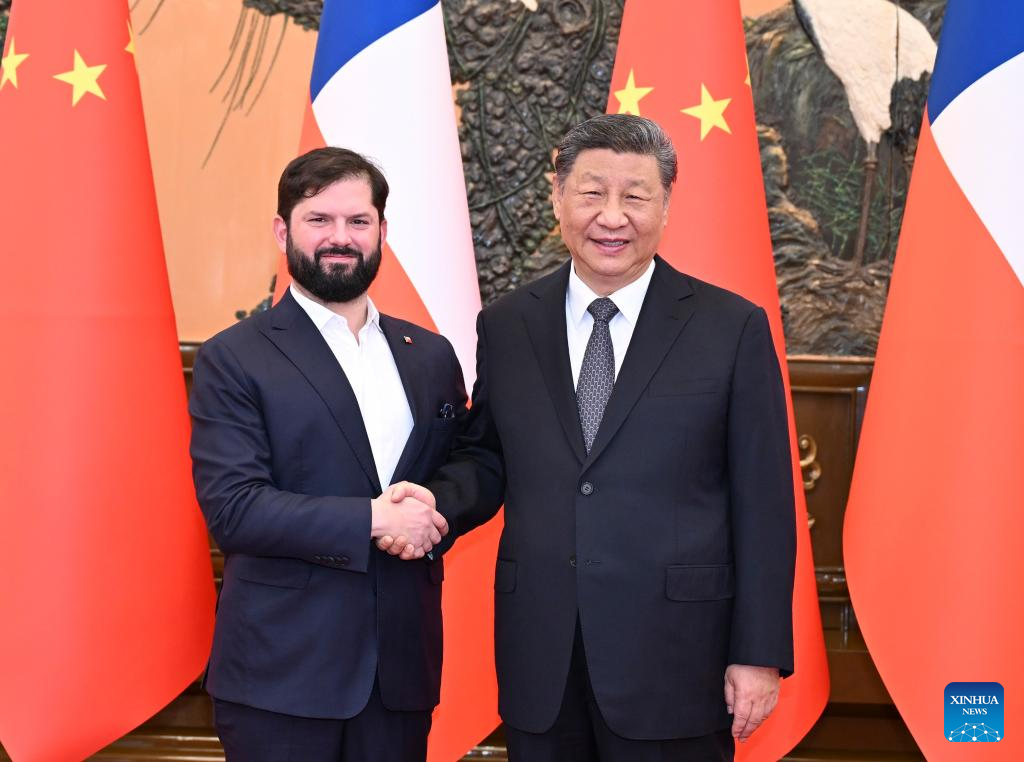 5.15习近平会见智利总统1.jpeg
