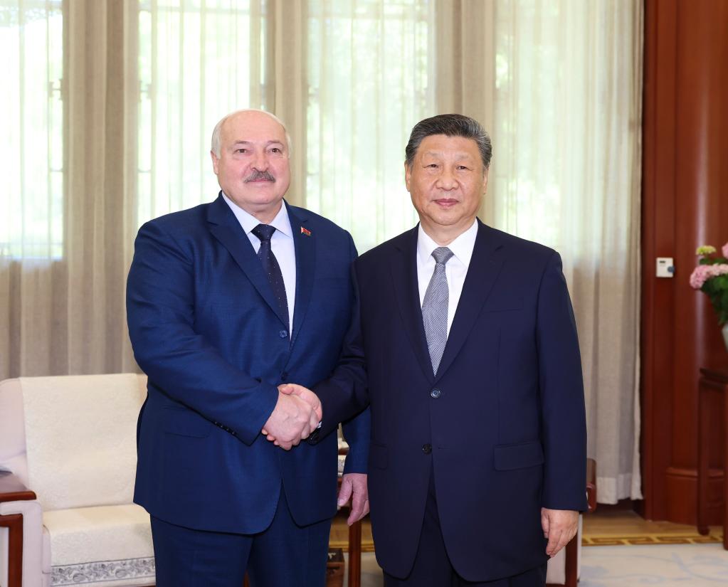 6.5习近平会见白俄罗斯总统卢卡申科.jpeg
