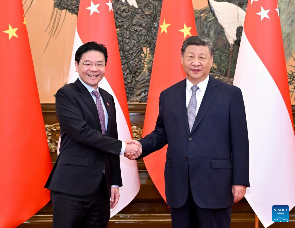 6.25习近平会见新加坡总理1.jpeg