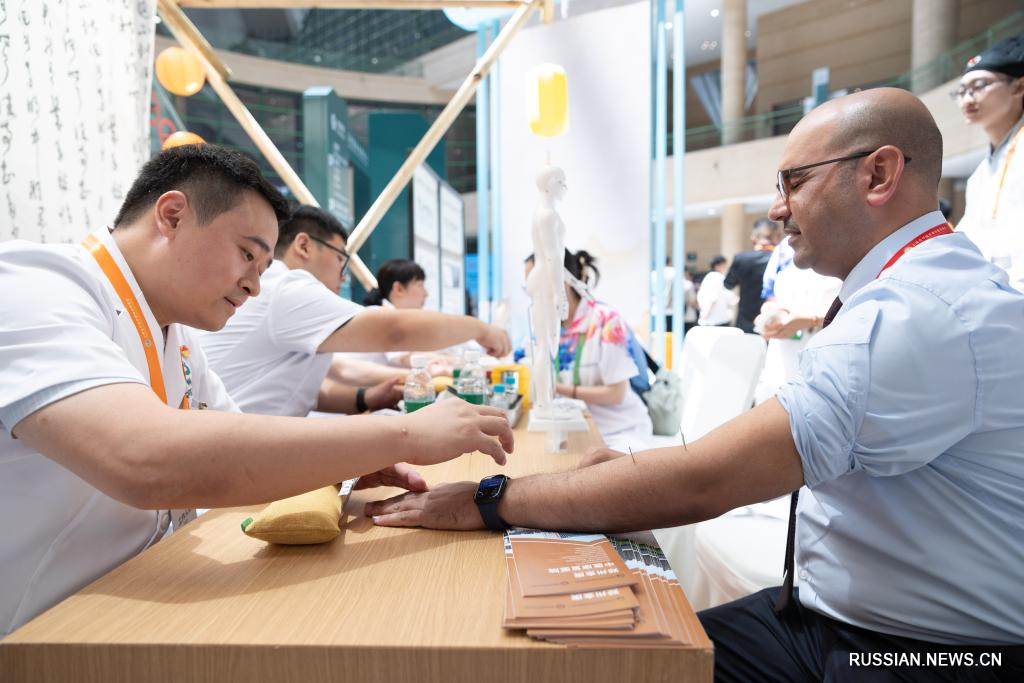 7.29上海合作组织媒体智库峰会代表体验中原文化3.jpg