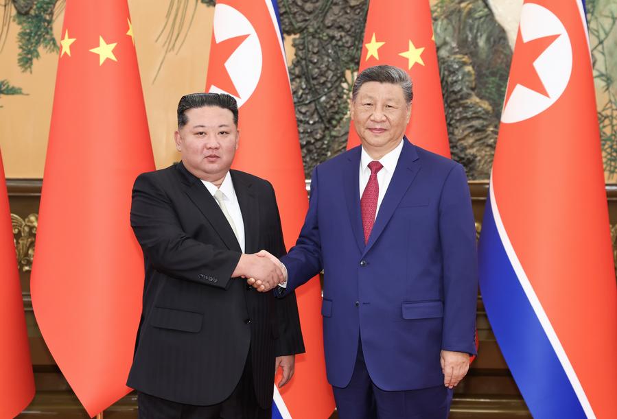9.5习近平同朝鲜劳动党总书记、国务委员长金正恩举行会谈1.jpg