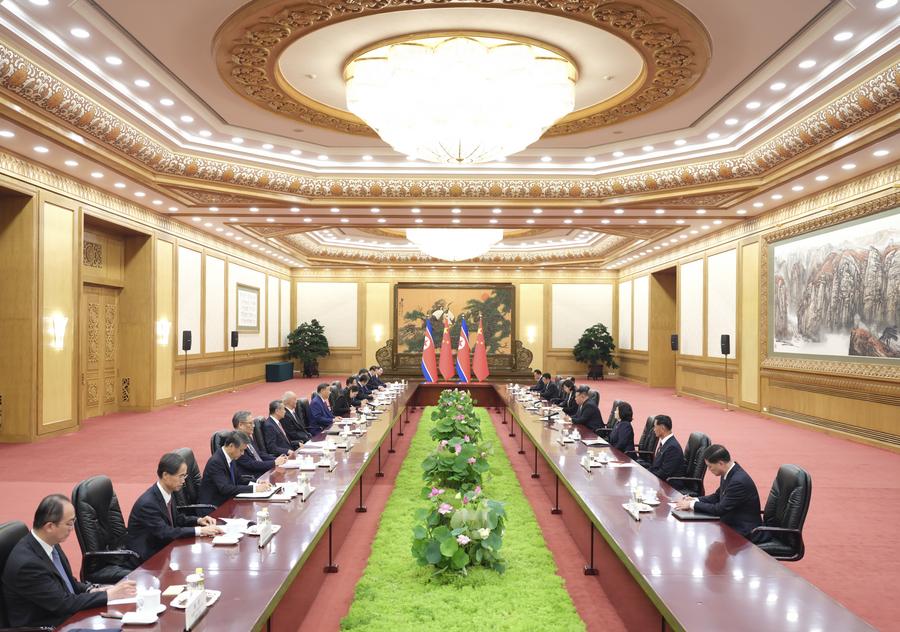 9.5习近平同朝鲜劳动党总书记、国务委员长金正恩举行会谈2.jpg