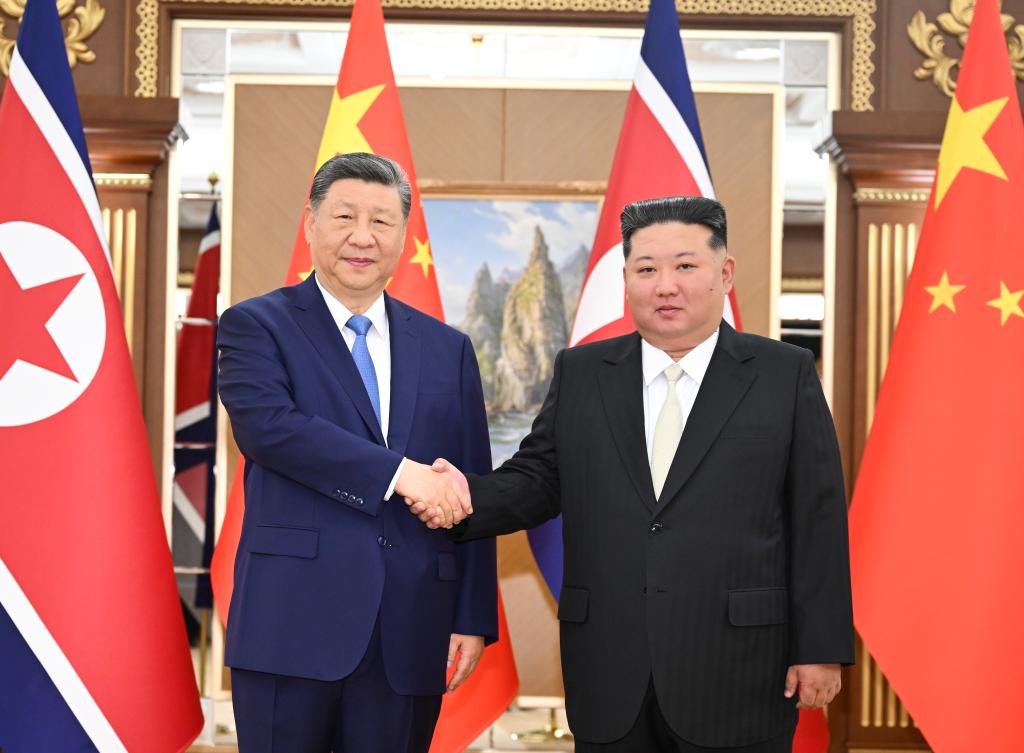 6.9习近平同金正恩举行会谈1.jpeg