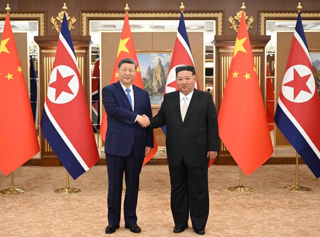 6.9习近平同金正恩举行会谈2.jpeg