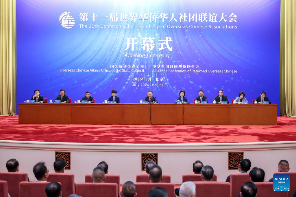 7.15王沪宁会见第十一届世界华侨华人社团联谊大会全体代表2.jpeg